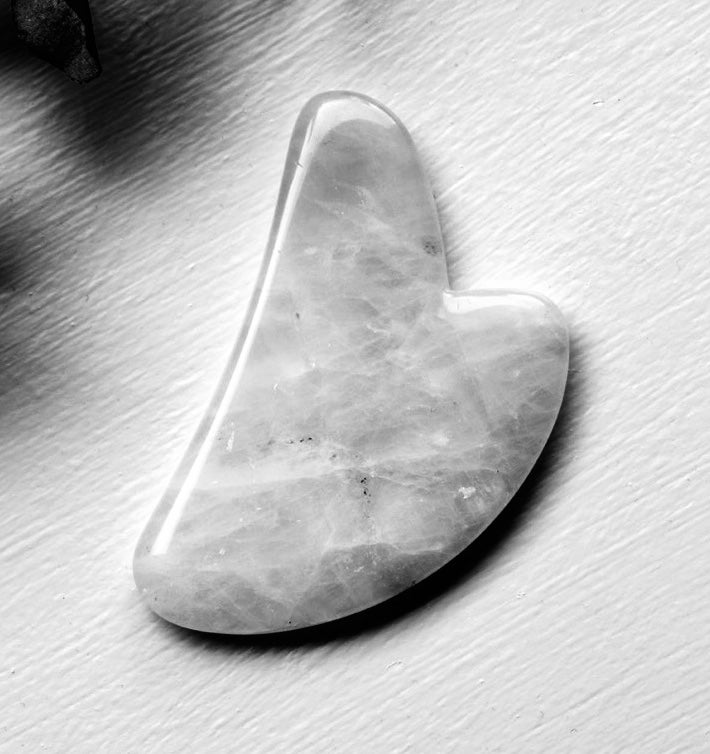 showinng the gua sha facial massaage tool