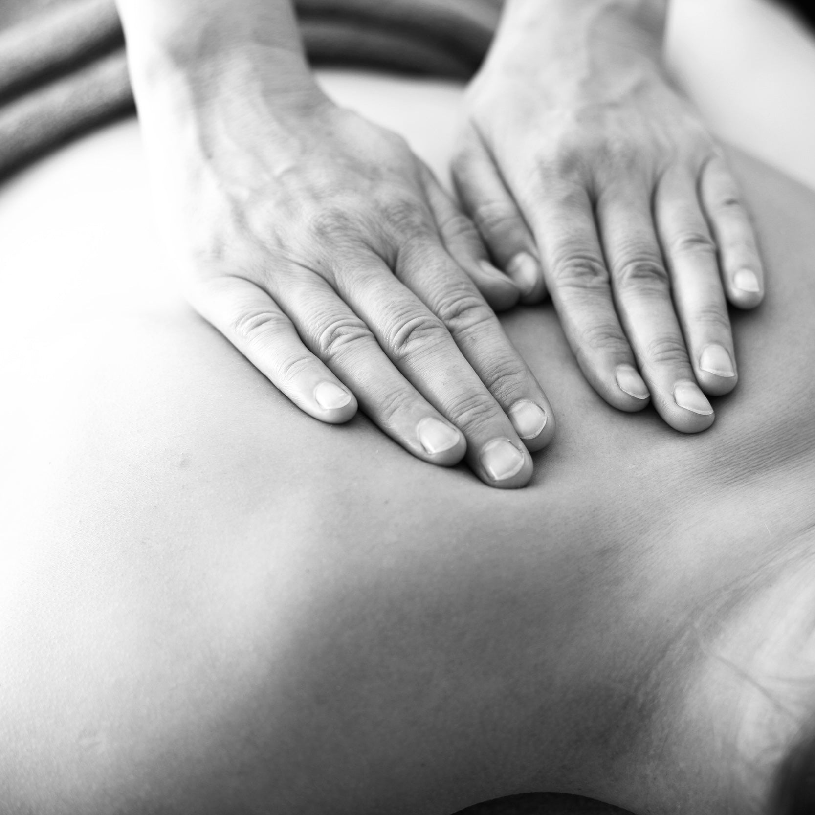 showing a lady having a back massage